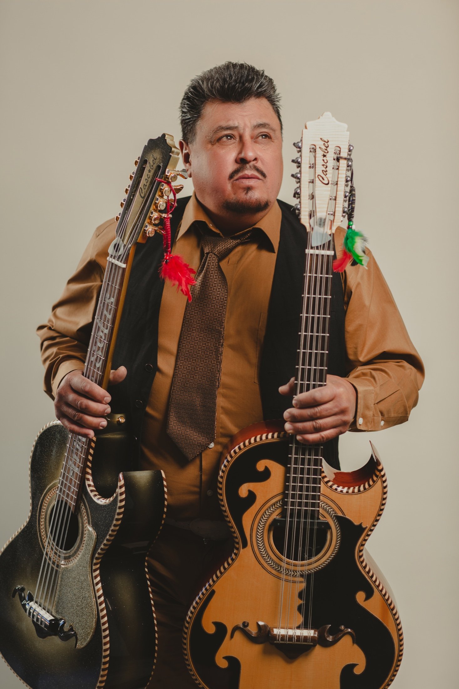 Armando Solís, harmony vocals and bajo sexto for Grupo Silverado