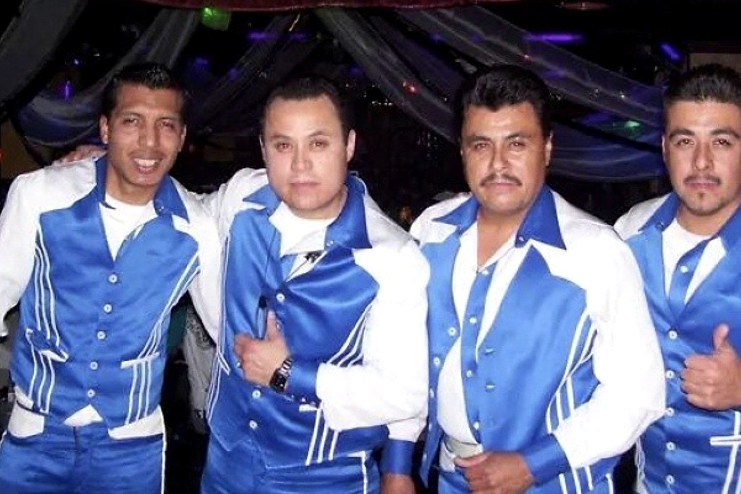 Grupo Silverado in blue-and-white stagewear during the 1990s